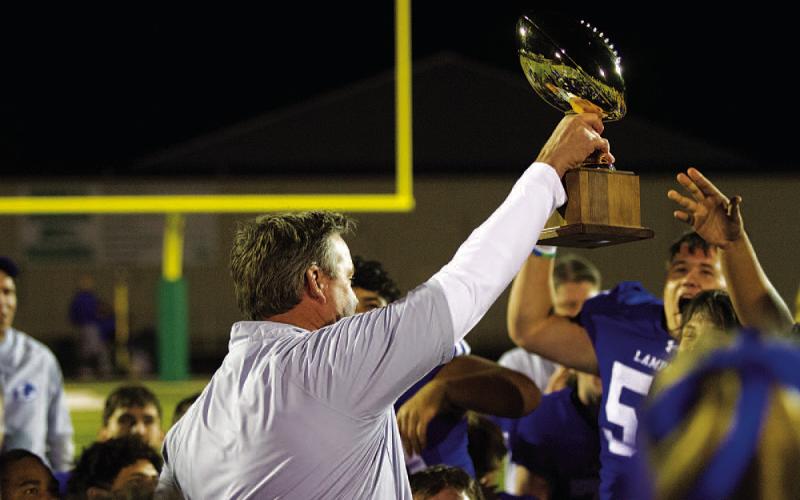 Lampasas head coach Troy Rogers celebrates the Badgers’ bidistrict win over Pecos last week. Tonight, the team will take on Dumas in an area-round matchup. Game time is 6 p.m. at the stadium in Andrews.