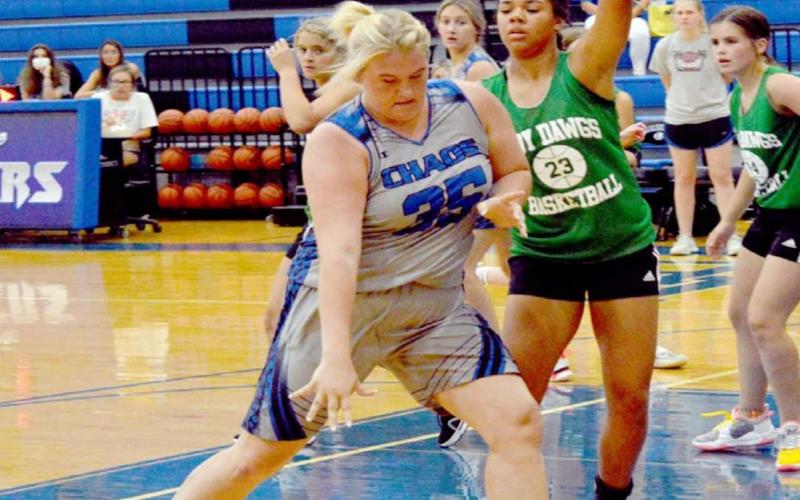 Kyliegh Ball (35) dribbles around a Burnet defender on Monday. JEFF LOWE | DISPATCH RECORD