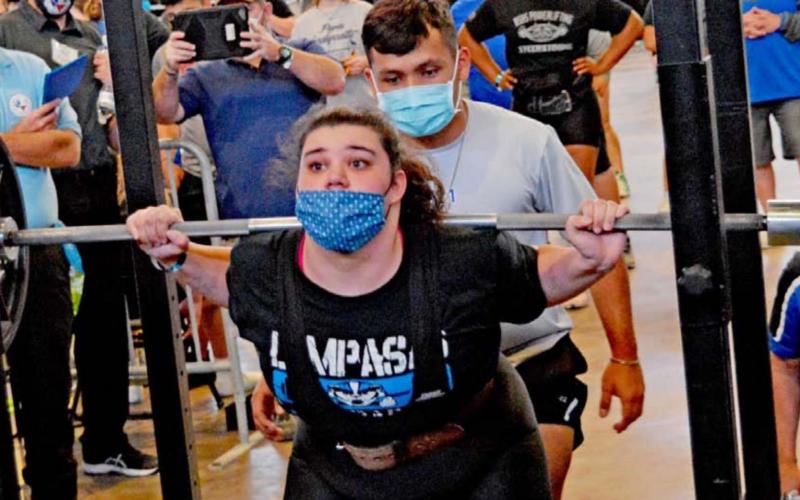 Lila Walling set a school record for her weight class in squat and also had her personal-best bench press. JEFF LOWE | DISPATCH RECORD