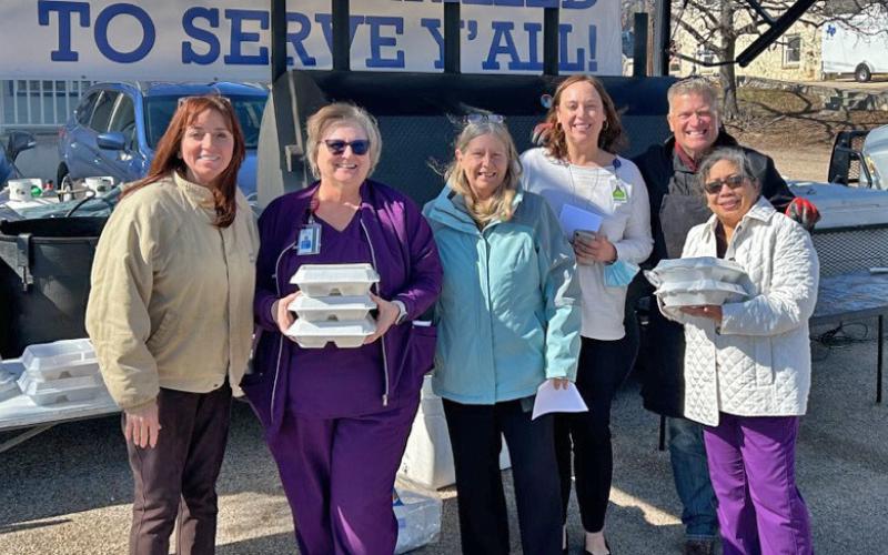A drive-through Lampasas First Responders Appreciation Lunch, hosted by the Benny Boyd auto dealership, took place Jan. 25. Pictured here with staff from AdventHealth Rollins Brook are chamber member Teresa Thornton, far left, and Jamie Erickson, back right, who was responsible for coordinating the lunch. courtesy photo