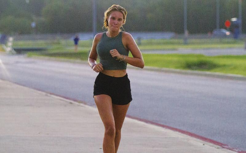 Mackenzie Shaughnessy runs through one of the drills during cross country practice. HUNTER KING | DISPATCH RECORD