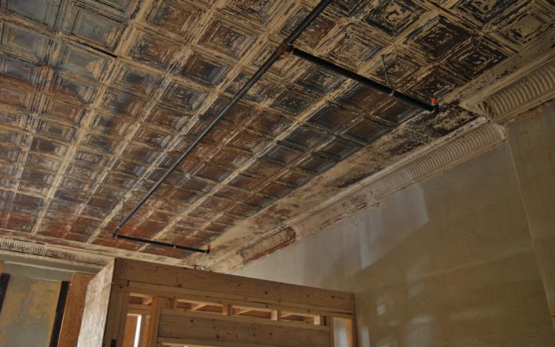 ERICK MITCHELL | DISPATCH RECORD The pressed tin ceiling inside the building at 511 E. Third St. convinced Austin native Myra Barlin to purchase and renovate the structure on the Lampasas courthouse square. See related, photo p. 10.