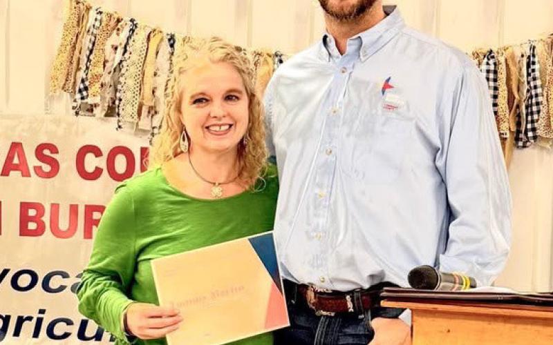 Tammy Carroll Martin was recognized by Heston McBride for her children’s ag literacy/ reading program efforts monthly at the Lampasas Public Library. Steve forsythe | courtesy photo