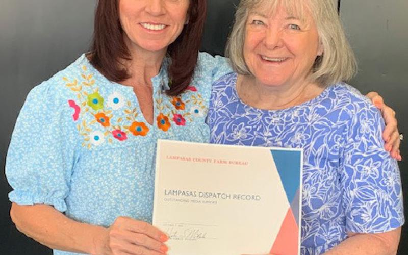 Lampasas Dispatch Record Advertising Director Teresa Thornton, left, and copublisher Gail Lowe display the certificate presented by Lampasas County Farm Bureau for the newspaper’s advocacy of agriculture issues. Steve Forsythe | courtesy photo