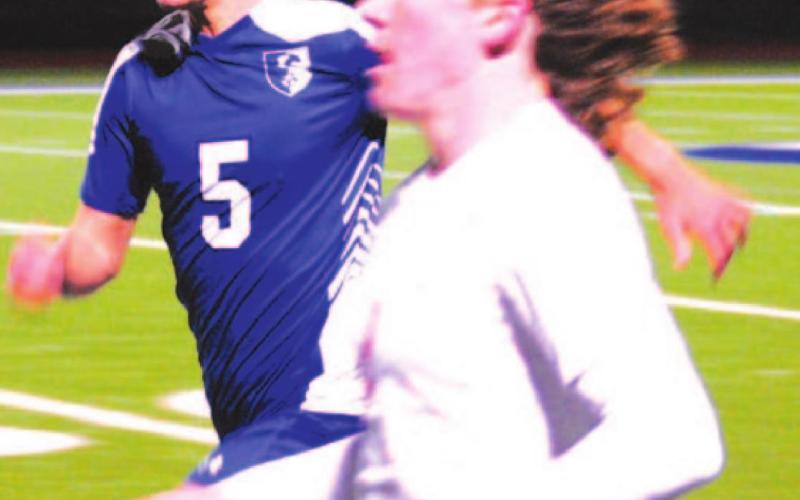 Thomas Swilley races a Salado player down the line during the Badgers’ most recent contest. HUNTER KING | DISPATCH RECORD