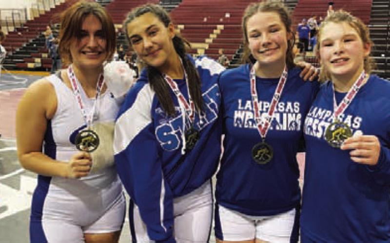 COURTESY PHOTO | DONOVAN KLECKNER Kaitlynn Jones, left, Charlie Freese, Jordan Winfree and Taylor Martell pose with their medals.