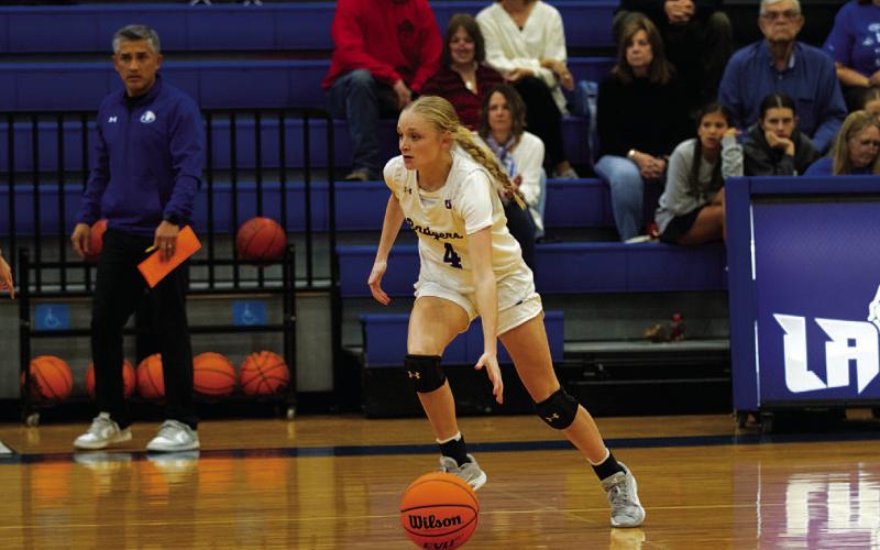 Adalya White dribbles up top during the Lady Badgers’ win on Tuesday. HUNTER KING | DISPATCH RECORD
