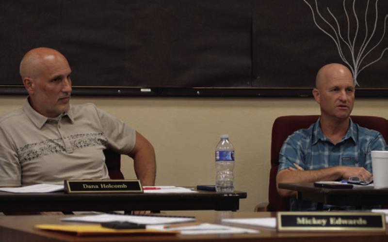 Assistant Superintendent Dana Holcomb, at left, told trustees at Monday’s school board meeting that acceptance by the state of the Lampasas ISD Teacher Incentive Allotment application is “the first big hurdle” that has been cleared. District administrators plan to implement the program in 2026-2027. Pictured next to Holcomb is LISD Chief Financial Officer Shane Jones. ERICK MITCHELL | DISPATCH RECORD