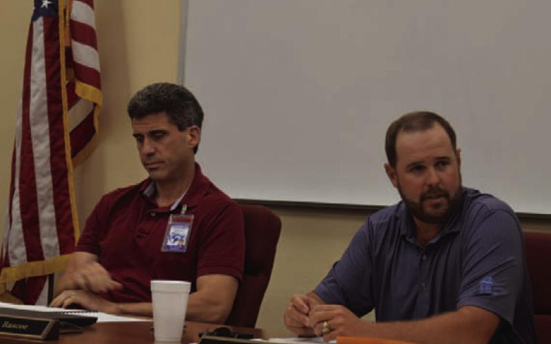 Lampasas ISD Superintendent Dr. Chane Rascoe and Board President Ryan Shahsn listen to input about the Teacher Incentive Allotment plan at Monday’s school board meeting. ERICK MITCHELL | DISPATCH RECORD