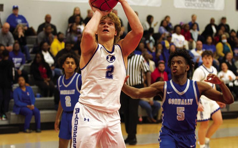 Haegan Oncken shoots from inside the paint during the second half of Tuesday’s playoff game. HUNTER KING | DISPATCH RECORD