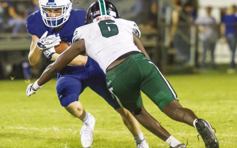 Freshman running back Housten Hill rushed for 38 yards on 11 carries with one touchdown. Hill, the only freshman on the varsity roster, is proving to be a key player in the Badgers’ two-man committee in the backfield. ANA SOFIA MEYER | DISPATCH RECORD