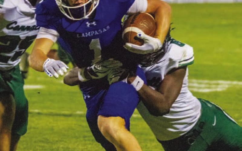 Wide receiver Kayden Van Pelt shakes off a tackle from a Cougar defensive back. ANA SOFIA MEYER | DISPATCH RECORD