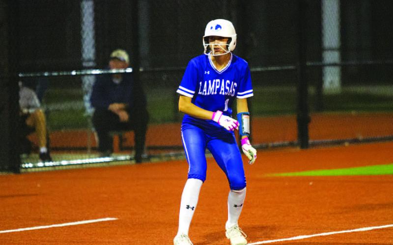 HUNTER KING | DISPATCH RECORD Allie Fry looks toward home plate as she moves off third base.