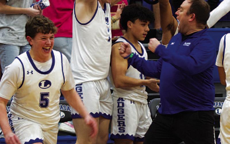 FILE PHOTO Head coach Aaron Nuckles hopes to have similar moments to this one in that the team can celebrate in 2023-2024.