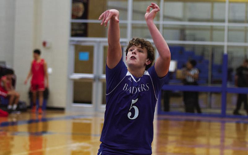 HUNTER KING | DISPATCH RECORD Aidan Nuckles releases a free throw during the Badgers’ final scrimmages of the season.