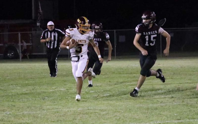 Senior Alonso Caso runs with the ball during Lometa’s 64-18 mercy-rule win over Ranger last Friday. JESSICA MALDONADO | DISPATCH RECORD