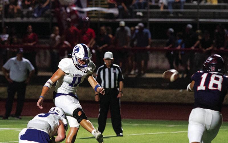 HUNTER KING | DISPATCH RECORD Landon Richardson swings through an extra point in the Badgers’ most recent game against Wimberley.