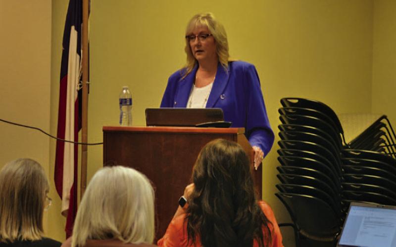 County Auditor Tragina Tallant presents budget and tax information for those gathered at this week’s public hearing. ERICK MITCHELL | DISPATCH RECORD