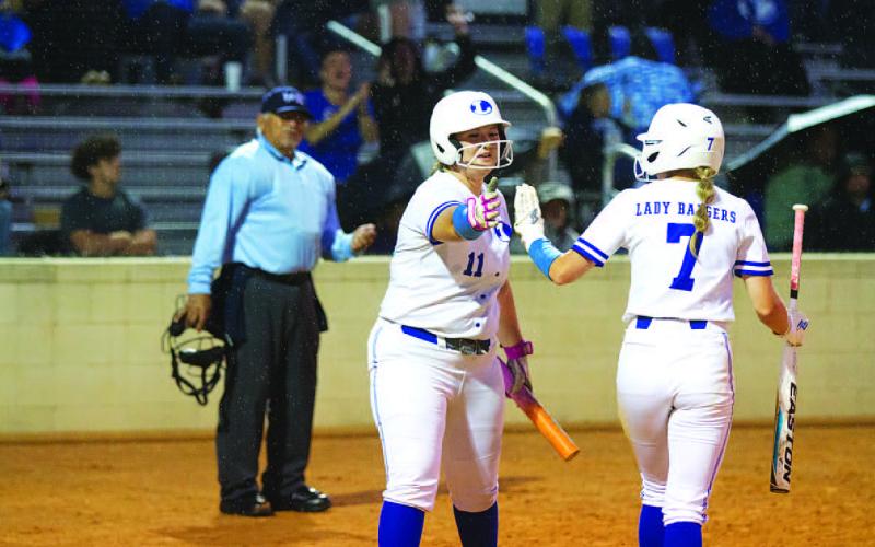 HUNTER KING | DISPATCH RECORD Laynee Bratey gives a high five to Kates after she scored.