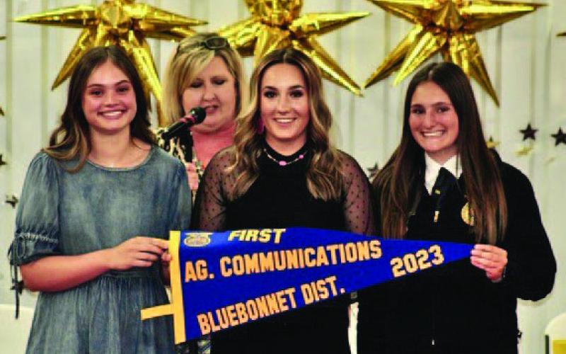 Lampasas FFA members, from left, Morgan Littlefield, Avery Hopson and Paige Rutland placed first in district, first in area and first in state in Agricultural Communications. Not pictured: team member Jamie Resa. FFA adviser Judy Hail, in back, said, “Our teams who traveled to state contests to compete represented Lampasas well and now rank in the top 2% in the state in their area of competition.” JOYCESARAH MCCABE | DISPATCH RECORD