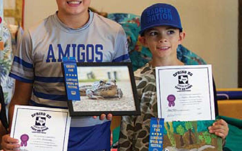 Eli Hernandez, left, and Noah Hernandez won the child categories for photography and art, respectively. Hunter king | dispatch record