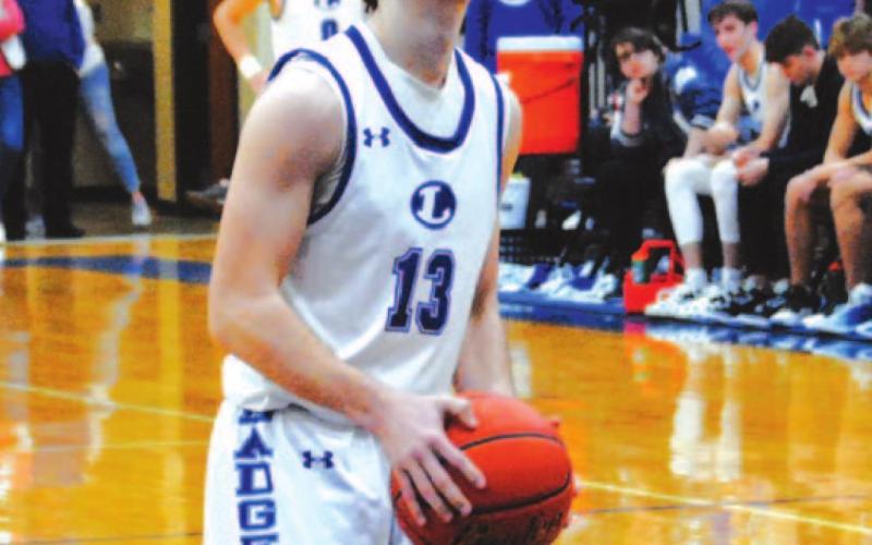 Cort Howard prepares to shoot a free throw in the Badgers’ game last week. HUNTER KING | DISPATCH RECORD