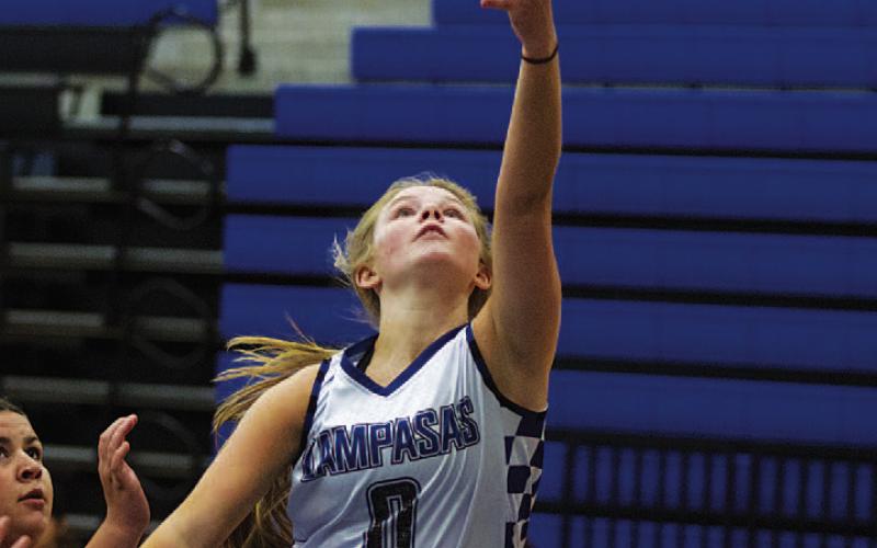 HUNTER KING | DISPATCH RECORD Addison Borchardt goes up for a layup. The Lady Badgers played their first summer league games Monday. They will play every Monday in June at the high school gym.