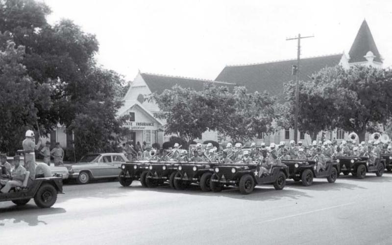 This 1960s-era Key Avenue parade included the 1st Armored Division Band riding in Jeeps, headed south on Key Avenue in front of what would become HEB grocery store. Horace Sargent’s real estate office and the Methodist Church can be seen in the background. lampasas dispatch file photo | jeff Jackson collection