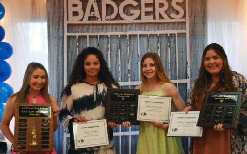 Award winners at the Lady Badgers’ softball banquet on Wednesday include, left to right, Battlin’ Badger Rose McAnally, co-Offensive MVPs Alycia Cantu and Aspen Wheeler, and Defensive MVP Caitlyn Sanguinet. JV team awards went to Offensive MVP Addison Berry, co-Defensive MVPs Karissa Perez and Daecee Ellis, and the JV Heart Award to Emma Lopez. JEFF LOWE | DISPATCH RECORD