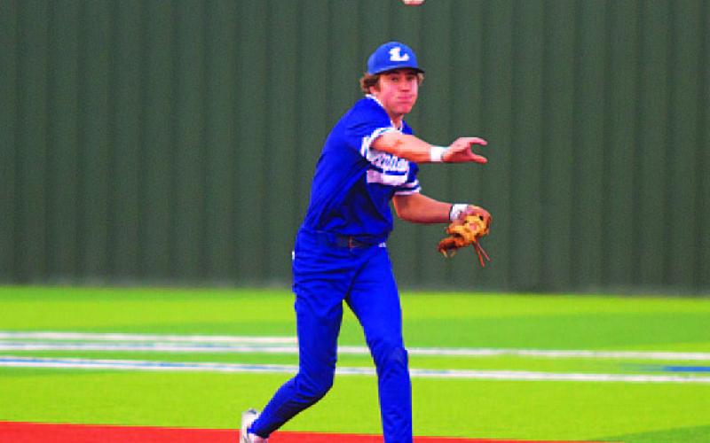 HUNTER KING | DISPATCH RECORD Owen Stubbs throws to first base to record an out during last Friday’s game against Jarrell.