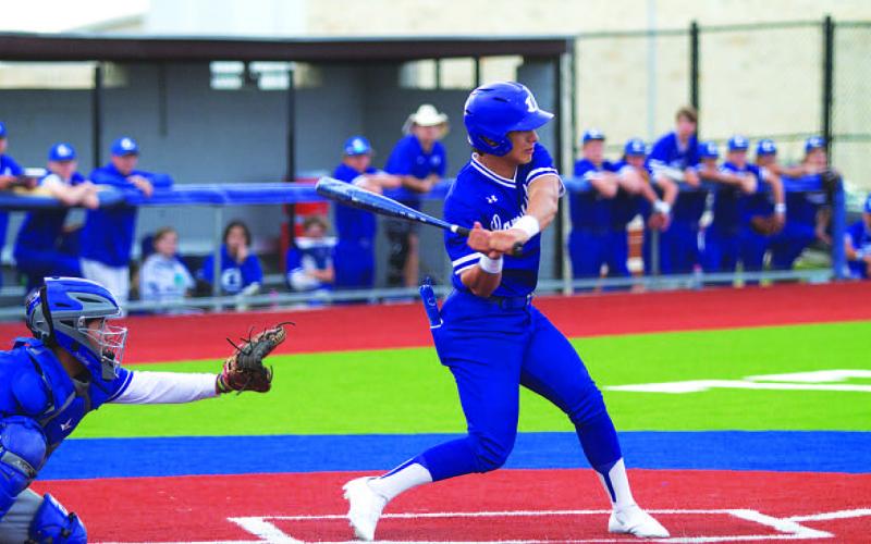 Elijah Calderon turns through a swing early in the Jarrell game. The sophomore is part of a young core for the Badgers. HUNTER KING | DISPATCH RECORD