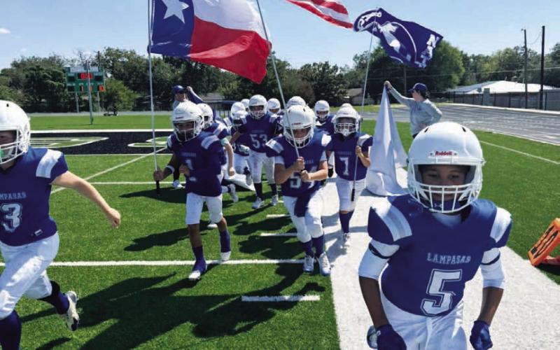 COURTESY PHOTO | SAM WALDRIP BBYL football players take the field for a game this past season.