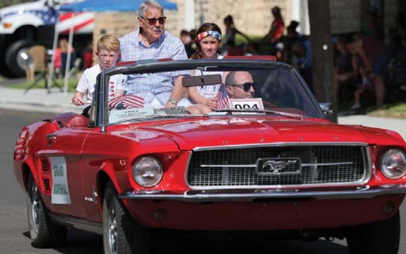 Parade marshal rides in style