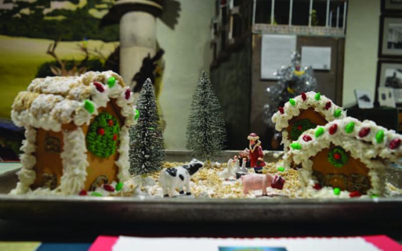 A close look is offered at one of the award-winning gingerbread houses on display at the Lampasas County Museum. This piece was made by Kylee Davis, who finished first in the 8- to 12-year-old youth division. ERICK MITCHELL | DISPATCH RECORD