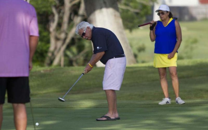 Rick Baskin hits a putt during the Britches and Bows tournament at Hancock Park Golf Course in Lampasas on Saturday. HUNTER KING | DISPATCH RECORD