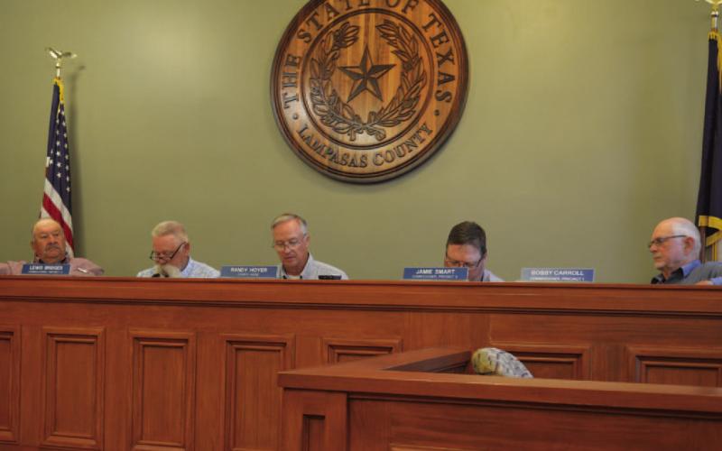 County officials discuss funding for the Hill Country Transportation District, known as “the HOP,” during Monday’s Commissioners Court meeting. ERICK MITCHELL | DISPATCH RECORD