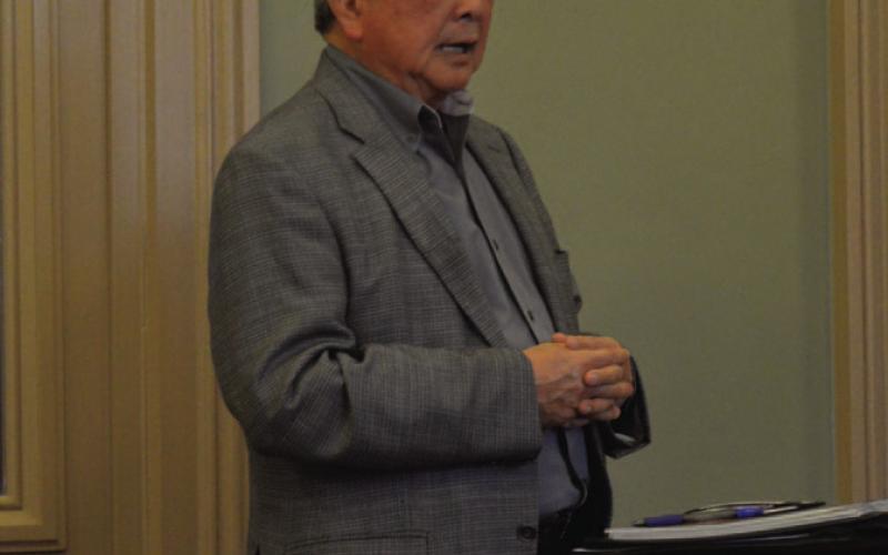 Karl Komatsu, president of Komastu Architecture, presents information on potential renovations needed for the courthouse. The Commissioners Court is expected to continue its discussion of the work at an upcoming meeting. ERICK MITCHELL | DISPATCH