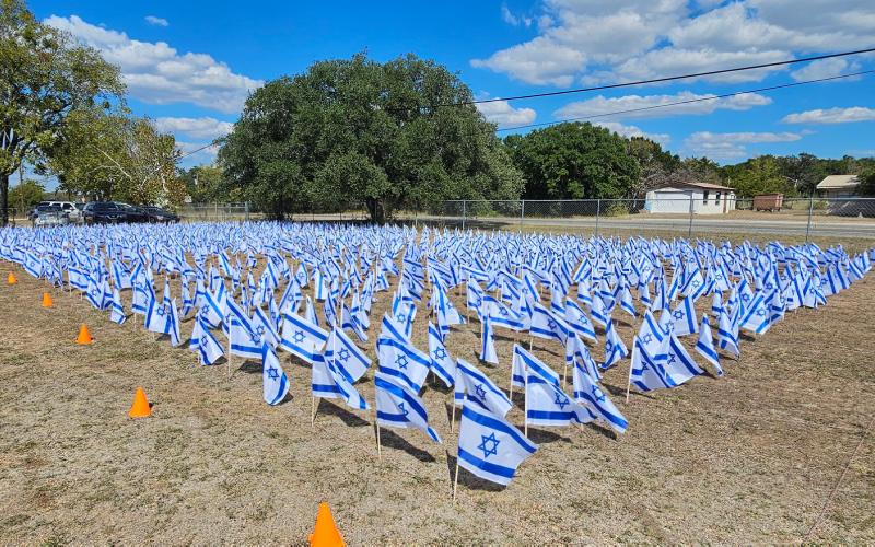 People from eight different ministries helped participate in putting up 1,200 flags over the weekend to memorialize the lives lost Oct. 7, 2023 in an attack on Gaza. “The event was a terrific success,” said Brian Parker, senior pastor of One Church Cove. The flags were on display this week at the Kempner Family Community Development Center. courtesy photo