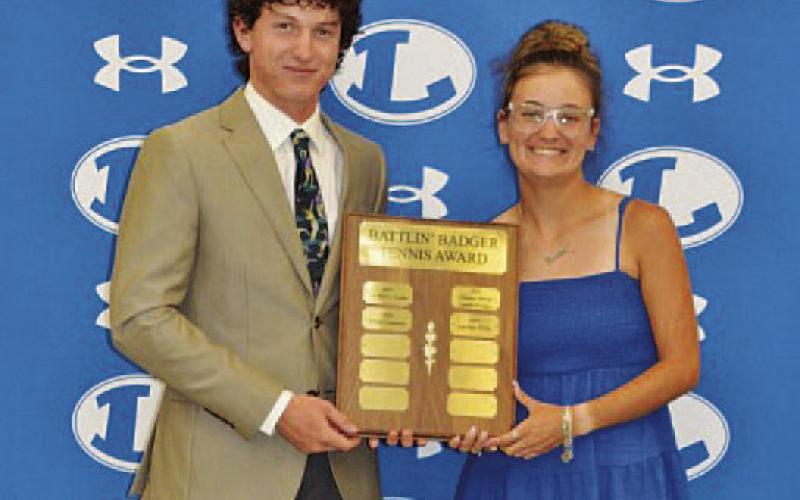 Elijah Copeland, left, and Caroline White won the Battlin’ Badger award for the 2025-2026 season. COURTESY PHOTO | KENNETH PEISER