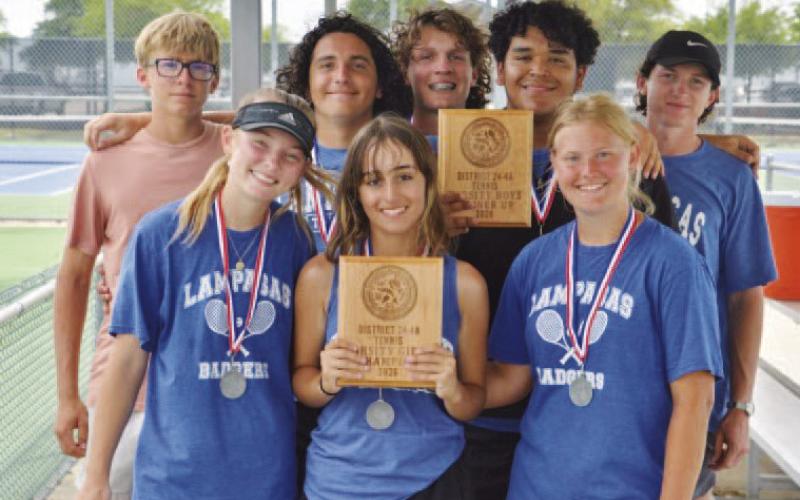 FILE PHOTO These members of the tennis team capped off a great season.