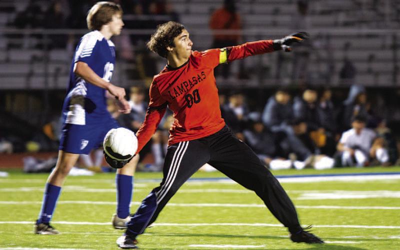 Michael Clayton throws the ball out to a teammate after making a save against Stephenville. HUNTER KING | DISPATCH RECORD
