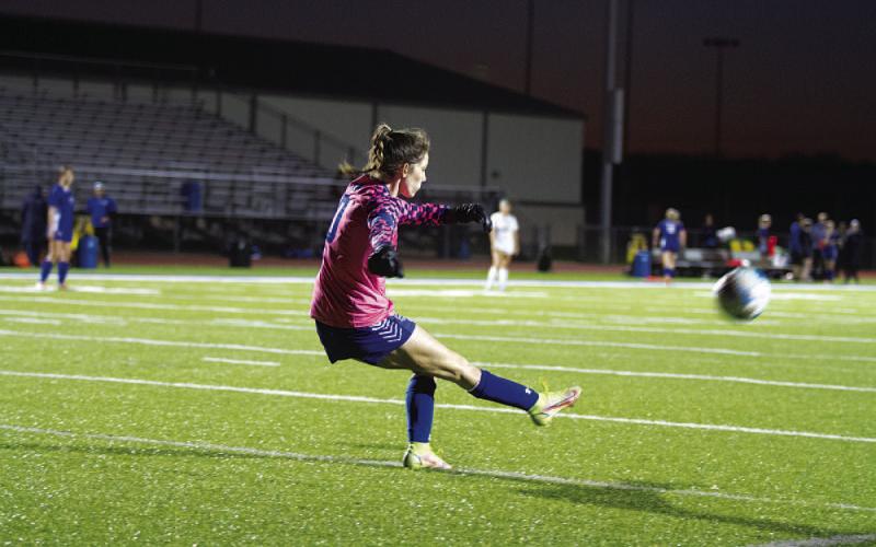 Nyla Long kicks the ball downfield during the second half of last Friday’s game. HUNTER KING | DISPATCH RECORD