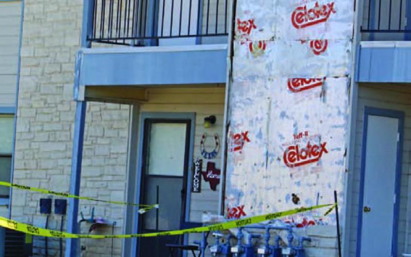 Storm damage included the rock front of the Riverview Apartments building. JOYCESARAH MCCABE | DISPATCH RECORD