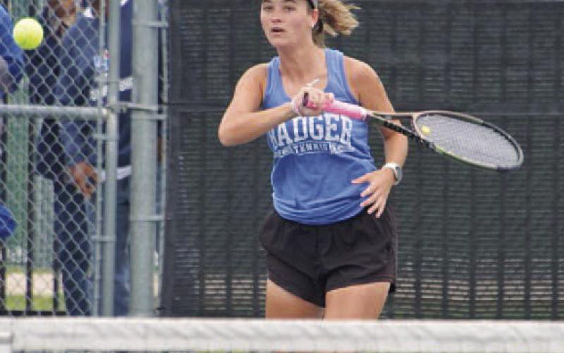 COURTESY PHOTO | KENNETH PEISER Caroline White follows through on a forehand shot.