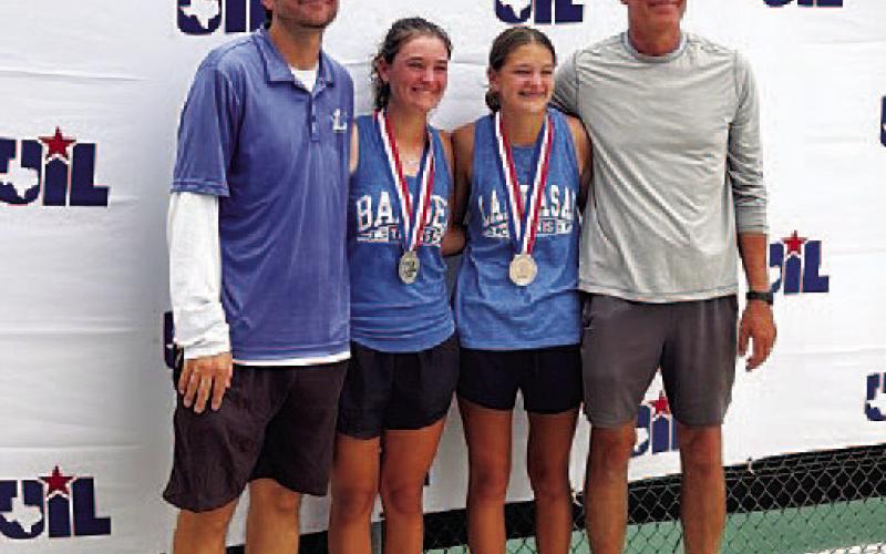 COURTESY PHOTO | KENNETH PEISER Eric White, left, Caroline, Madelynn and Kenneth Peiser pose for a photo with the silver medals.