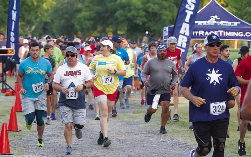 HUNTER KING | DISPATCH RECORD More than 400 total runners signed up to participate in the Spring Ho races last week.