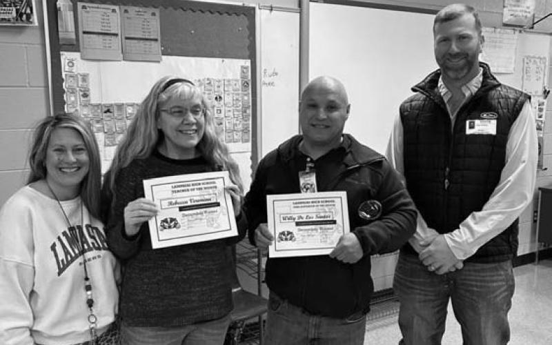 Instructional specialist Kalin Wells, at left, and Texas Farm Bureau Insurance representative Clay Phillips, at right, congratulate Rebecca Veroneau and Guillermo De Los Santos for their selection as special faculty of the month at LHS. COURTESY PHOTO
