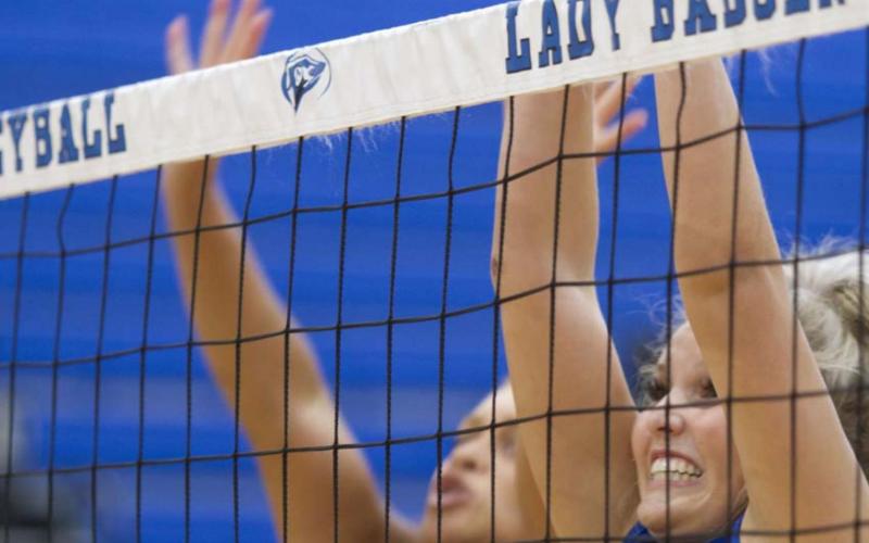 Laurcy Bender goes up for a block during Friday’s scrimmage in Lampasas. HUNTER KING | DISPATCH RECORD