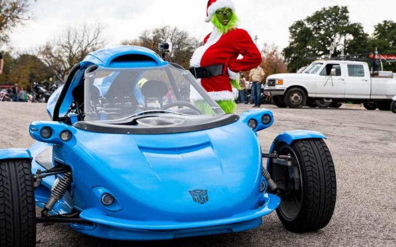 Andrew ‘Mr. Grinch” Jaramillo was in character next to his 2014 Campagna at the Tri-County Toy Run that ended at Hancock Park in Lampasas. Mr. Grinch is a staple at the annual event intended to provide toys for children. JEROMIAH LIZAMA | DISPATCH RECORD
