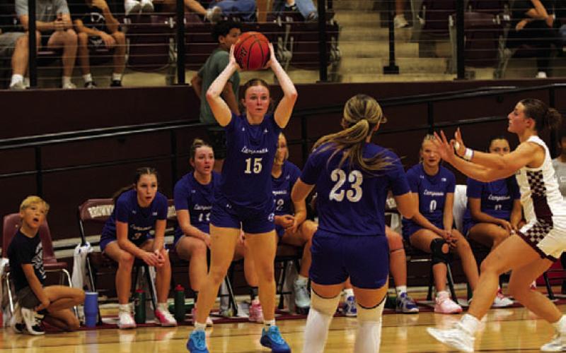 HUNTER KING | DISPATCH RECORD Kari Kepler looks for a passing option against Brownwood.